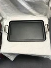 Cuisinart 655-35 Chef's Classic Quantanium Non-stick 13X20 Double-burner Griddle New. Price: $12.99.
