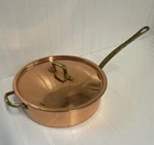 Copper Saute Pan W/ Lid 9IN Round Stainless Steel Interior Double Handles Used. Price: $47.50.