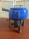 Vintage Dansk 1HQ Kobenstyle Blue Enamel Wood Handle Fondue Pot Cast Iron Stand Used. Price: $75.00.