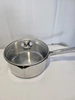 Wear Ever 1.5 Quart Dual Pour Spout Stainless Steel Sauce Pan With Strainer Lid Used. Price: $32.00.
