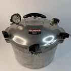 All American 915 Stove Top Pressure Cooker Silver Gauge Locking Lid Used. Price: $230.00.