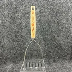 Vintage Ekco Nylon Handle Onion Garlic Touch 'o Spice Almond Usa Potato Masher Used. Price: $25.00.