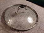 10" Ecolution Symphony Glass/stainless Replacement Lid Vent/cool-touch Handle Used. Price: $14.99.