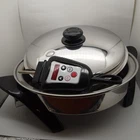 Saladmaster 304/316TI 12" Electric Skillet Titanium Stainless Oil Core SA012OCU Used. Price: $280.00.