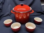 Creuset Lot Enameled Steel 16 Qt. Stockpot, Cerise Red & 4 Matching Ramakins Used. Price: $199.00.