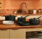 Our Place 8-PIECE Essentials Ceramic Nonstick Oven Safe Cookware Set Black Pans New. Price: $99.00.