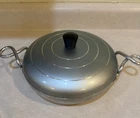 Vintage Wear-ever Baster Blue Lid Covered Aluminum 9" Pan NO.J901 Used. Price: $39.20.