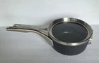 Calphalon Premier 1.5-QT. Space-saving Hard-anodized Nonstick Sauce Pan And Lid Used. Price: $39.99.