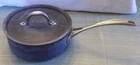 Calphalon Commercial Anodized Aluminum 8782-2 2.5 Quart Qt Saucepan Pot W/ Lid Used. Price: $21.99.
