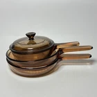 Vintage Visions Corning Amber Glass Cookware Set Skillets Saucepan Pyrex Lid 4PC Used. Price: $49.99.