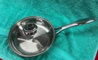 Wolfgang Puck Bistro Elite Collection 8 Omelet Pan, Stainless With Glass Lid Used. Price: $16.00.