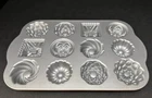 Nordic Ware Bundt Charms PAN1.2 1B New. Price: $30.00.