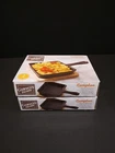 2 Gibson Home Campton Mini Cast Iron Rectangular Skillets With Wooden Bases New. Price: $22.50.