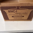 Amana Country Cooker MWC-1 Stoneware Casserole, 11" X 5", House Scene, With Lid. Price: $39.00.