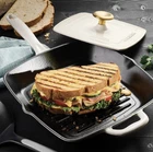 Nib New Tramontina 11" Cast Iron Grill Pan With Press - Beige. Price: $69.99.