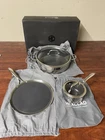 Hexclad Hybrid Cookware 5-PC Set W/ Lids 7QT, 1QT Pot & 12 Griddle Pan Used. Price: $214.99.