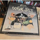 Vintage 1982 Himark Nob Deluxe 10PC Stainless Steel Wok Set New. Price: $38.00.