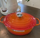 New Creuset Signature Enameled Cast Iron Oval Dutch Oven 8 Qt Flame Box 33. Price: $325.00.