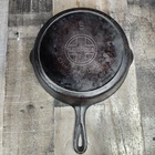 Griswold No. 9 Cast Iron Skillet Slant Logo 710 Used. Price: $130.00.