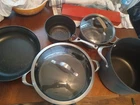 Set Of 5 Calphalon Pots & Pans Used. Price: $90.00.