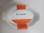 Le Creuset Heritage Stoneware Oval Au Gratin Dish 9 1/2 Inch 1/8 Qt. Price: $29.99.