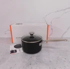 Le Creuset Toughened Nonstick Pro Saucepan With Glass Lid, 2-QUART New. Price: $124.95.