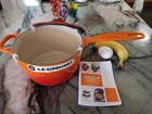 New In Box-le Creuset Cast Iron 2.25 Qt Saucepan Flame Orange, Lifetime Warranty. Price: $259.99.