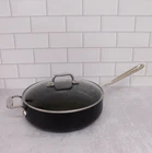 All-clad HA1 Hard Anodized Nonstick Saute Pan With Glass Lid, 4 Quart New. Price: $129.95.