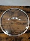 Calphalon Cookware Replacement Glass Lid 11 3/4 Od Inside Diameter Used. Price: $16.67.