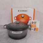 Le Creuset Signature Cast Iron 4.5 Quart Round French Oven, Oyster - New. Price: $369.95.