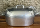 Wagner Ware Sidney Magnalite 4267-P / 13 Qt Roaster With Trivet Used. Price: $299.00.