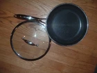 Hexclad Hybrid Nonstick Frying Pan 10-INCH With Lid & Stay Cool Handle Oven-safe Used. Price: $59.99.