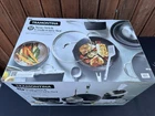 Tramontina 12-PIECE Ceramic Non Stick Pots & Pans Cookware Set With Utensils Used. Price: $100.00.