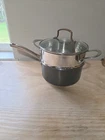 Cuisinart Model #7193-20 Saucepan W/ Lid 3QT &7116-20 Steamer Pot Fits Both Used. Price: $30.00.