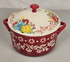 The Pioneer Woman Fancy Flourish Cocotte Stoneware 1 Qt Casserole Dish With Lid. Price: $27.99.