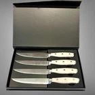 Zwilling Ja Henckels 4 Piece Steak Knife Set White Handles Forged Used Once. Price: $37.50.