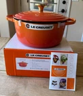 Creuset Signature Round Dutch Oven W/ Crucible Knob Flamme Doree 4.5 Qt New. Price: $419.99.
