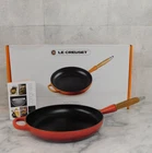 Creuset Alpine Cast Iron 10.25 Inch Fry Pan With Wood Handle, Cerise New. Price: $209.95.