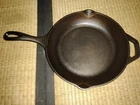 Hand-seasoned? Lodge Cast Iron Skillet #10 Made In Usa- Low, Rounded Walls Used. Price: $22.99.