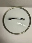 Cuisinart Tempered Glass Cookware Lid Stainless Steel Rim- Fits 9" Pan Used. Price: $15.00.