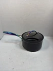 Thyme & Table Non-stick 2.5 Qt Signature Sauce Pan With Glass Lid, Rainbow A1 Used. Price: $30.00.