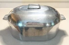 Magnalite Ghc Usa 13 Qt Roaster Dutch Oven W/ Trivet And Lid 4267 Used. Price: $225.00.