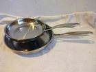 Cuisinart Stainless Steel Induction Ready TPSS22-20 8" & TPSS22-254 10" Skillets Used. Price: $49.99.